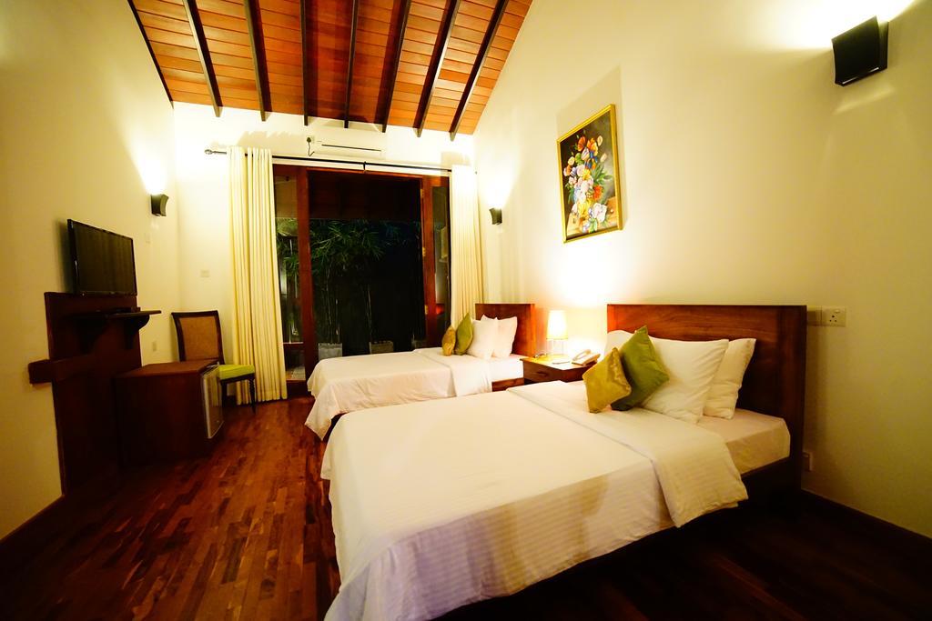 Lespri Grand Hotel Negombo Cameră foto
